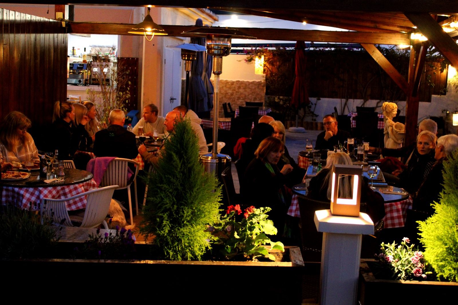 A full terrace after dark